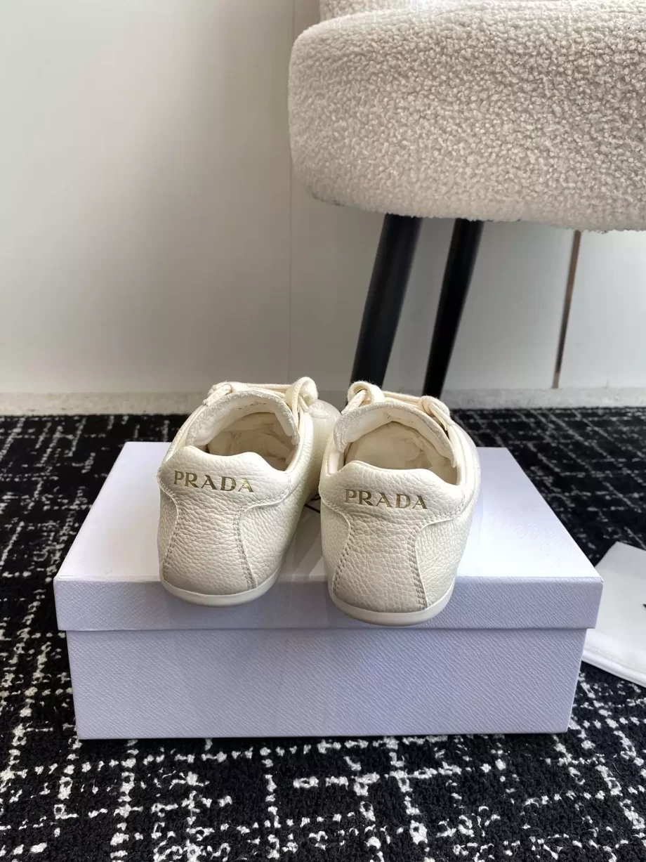 Prada Ivory Leather Sneakers - PRD067